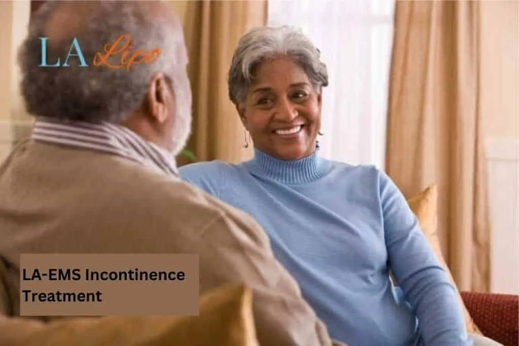 Couple sat smiling at each other - LA-EMS treatment Hereford